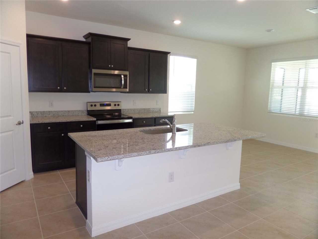 7822 Penrose Pl - Photo 4 of 35