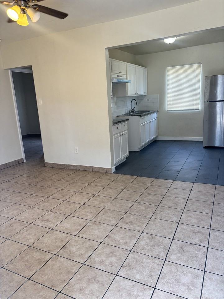 113 W. CENTURY RED. - Photo 4 of 10