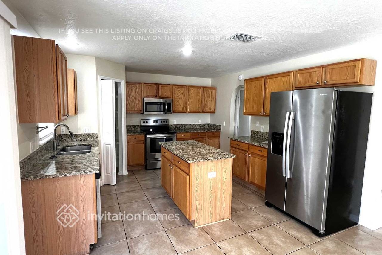 2553 Sw Grotto Cir - Photo 7 of 19
