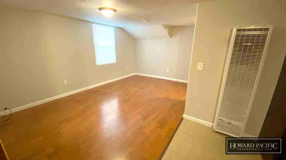 419 E 6TH ST - Photo 7 of 24