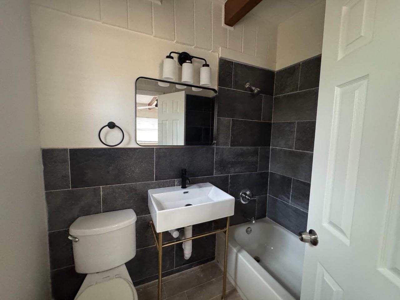 PK3 - 1214 E 138TH AVE - Photo 2 of 4