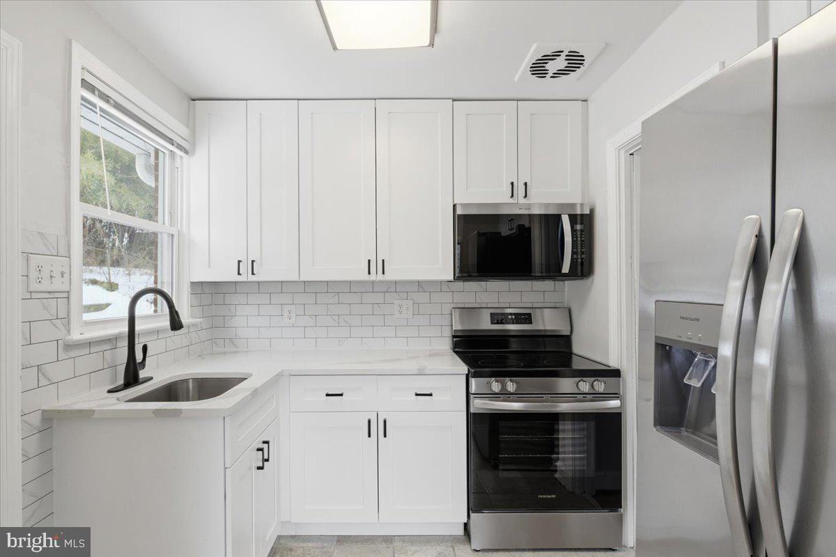 9704 Lorain Ave #1 - Photo 7 of 27