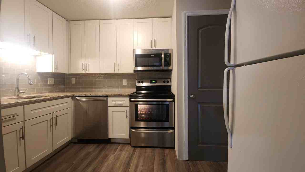 8717 Watson Rd - Photo 2 of 10