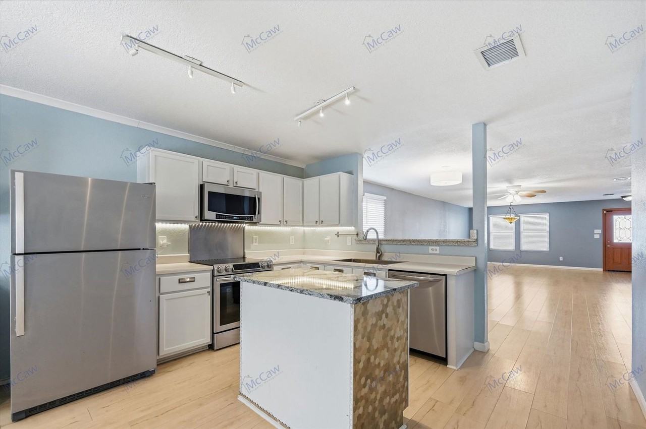 8401 Swan Park Dr - Photo 7 of 21