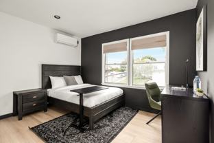 A 4 Bedroom, 3 Bathroom apartment with common areas and a fully functional kitchen at 1476 Malcolm Ave. - Photo 1 of 1