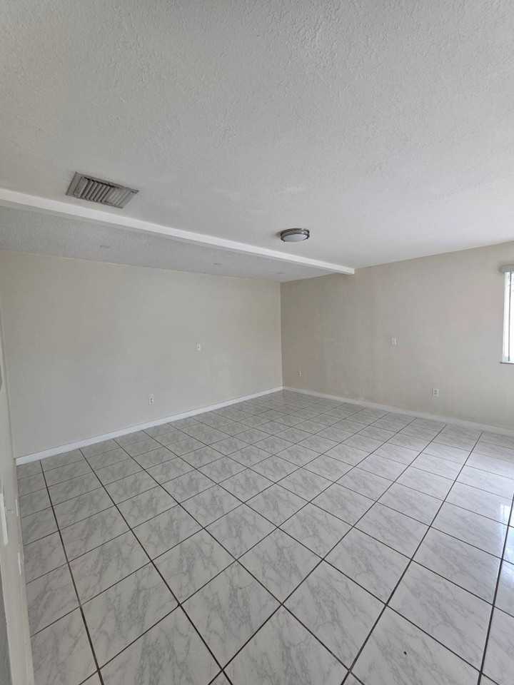 1475 W 31st St #2 - Photo 7 of 9