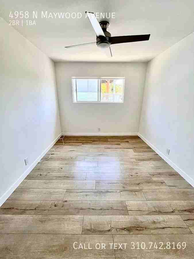 4958 N Maywood Ave - Photo 4 of 6