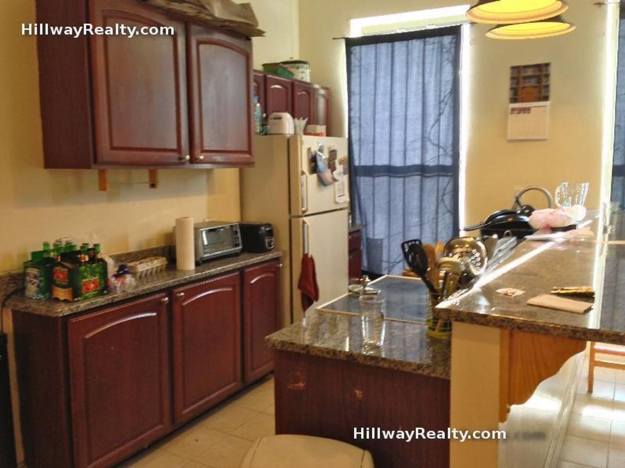 671 Massachusetts Ave - Photo 2 of 3