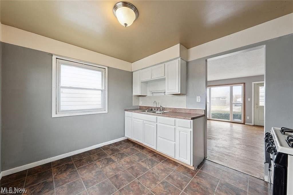 12214 Woodward Blvd - Photo 3 of 28