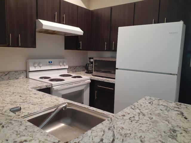 911 Lyons Rd - Photo 2 of 16