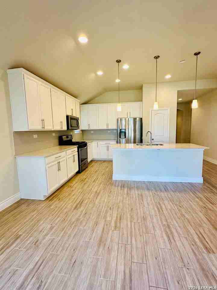 7711 Cottonwood Rdg - Photo 3 of 24