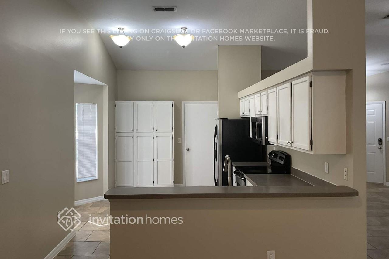 4416 11th Ave E - Photo 5 of 14