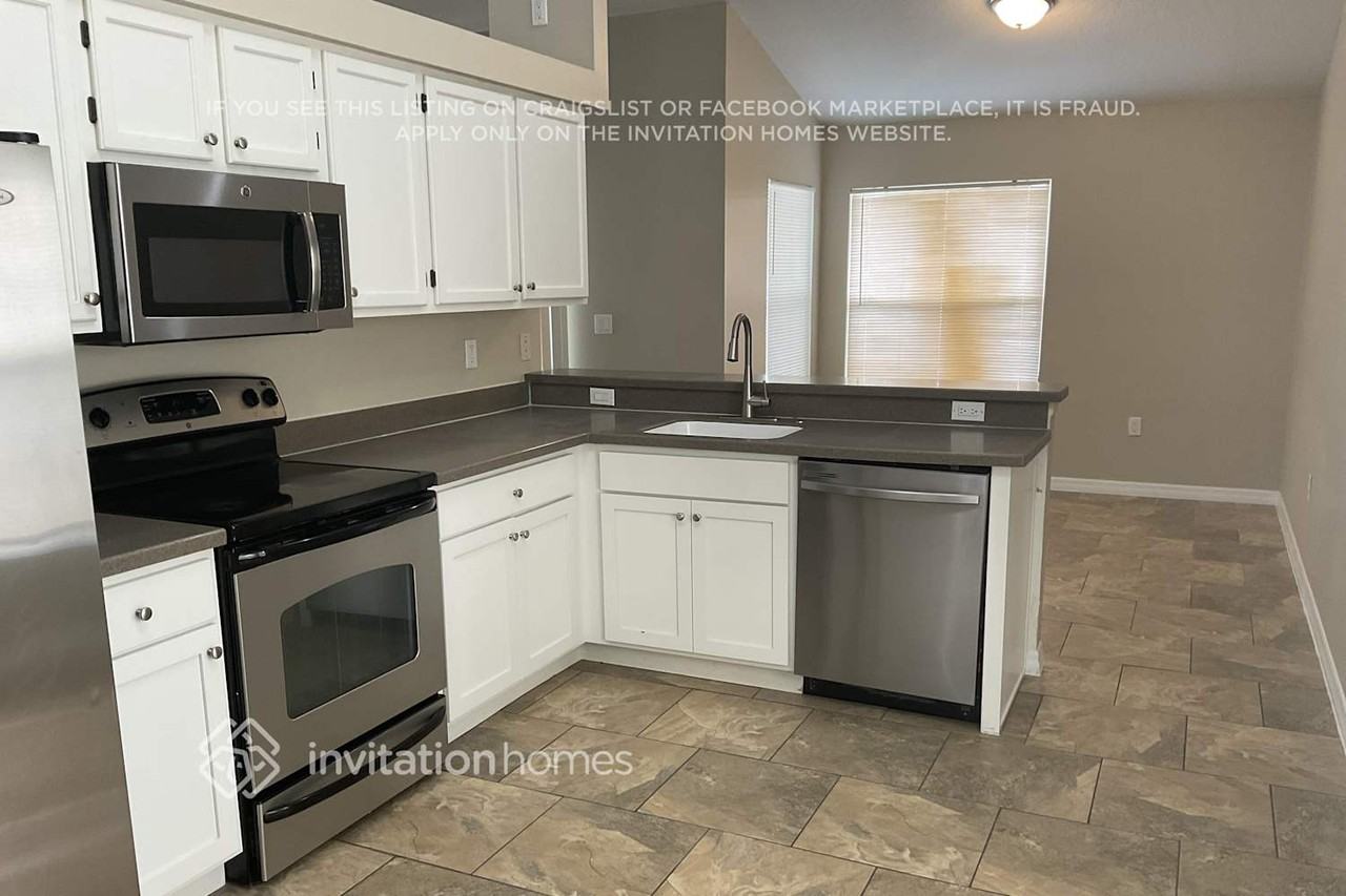 4416 11th Ave E - Photo 6 of 14