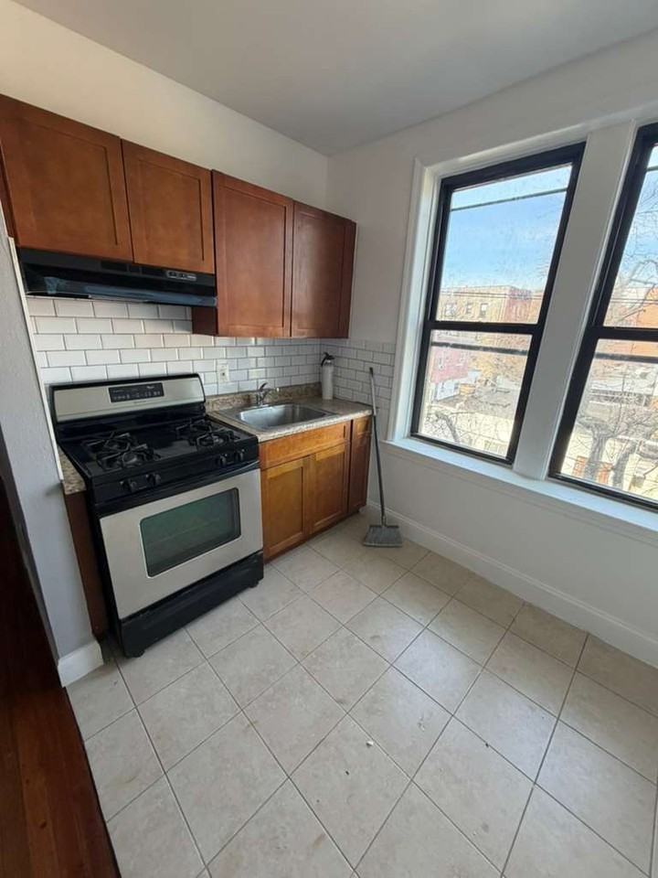 702 Chancellor Avenue LLC - Photo 6 of 9