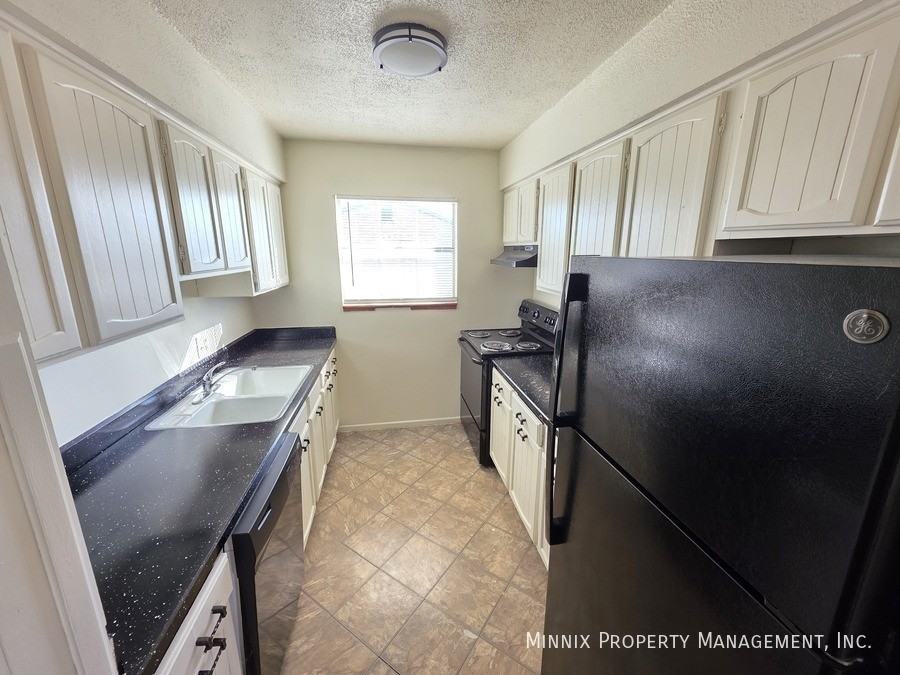 Whispering Oaks 1904 N. Midland - Photo 2 of 50