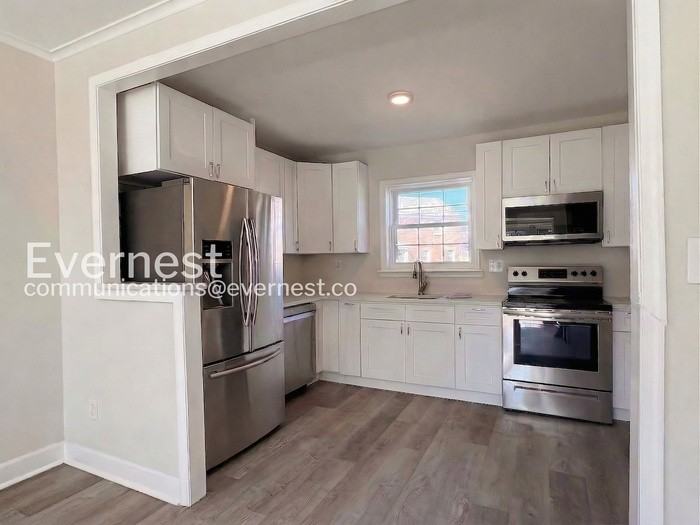 1210 E 36th St - Photo 2 of 29