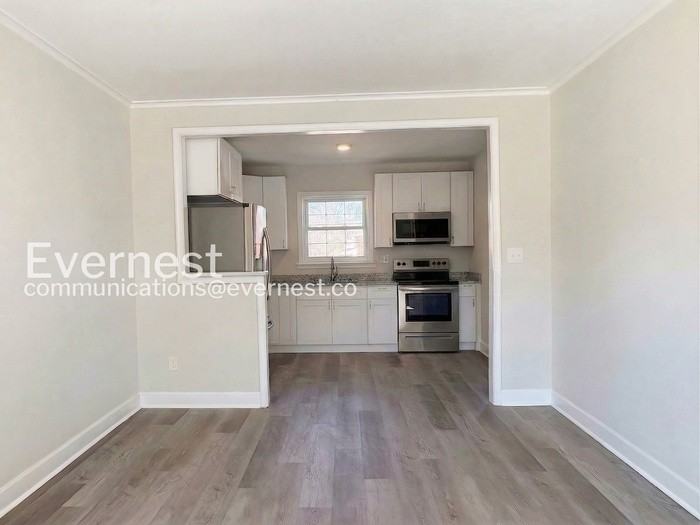 1210 E 36th St - Photo 4 of 29