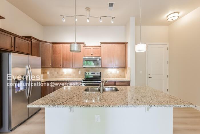 305 Inverness Way S #102 - Photo 2 of 22