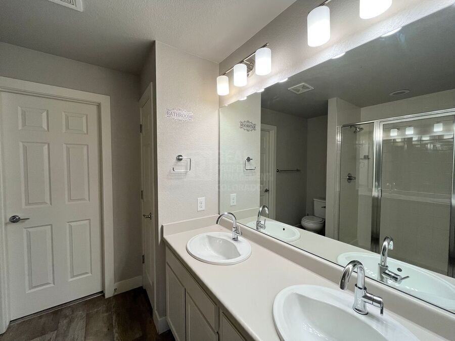 16078 E 47th Dr - Photo 7 of 12