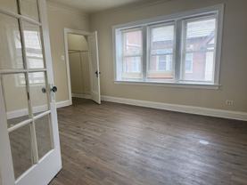 7105-7111 South Champlain Avenue/635-643 East 71st Street - Photo 1 of 1