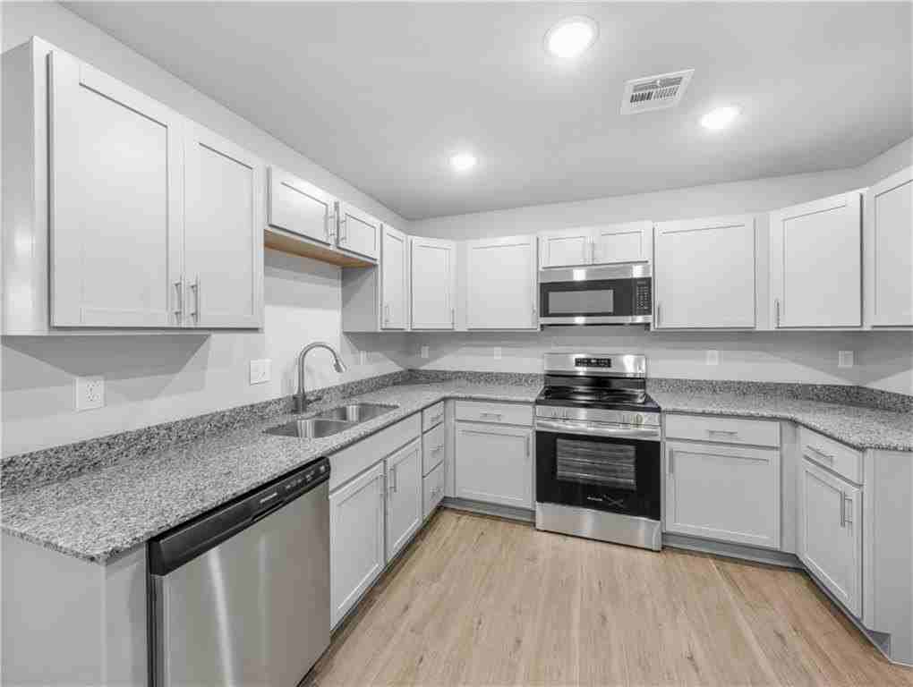 6613 & 6615  NW Altus  ST - Photo 3 of 14