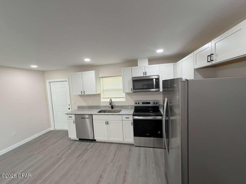 801 E 12th Ct - Photo 6 of 11