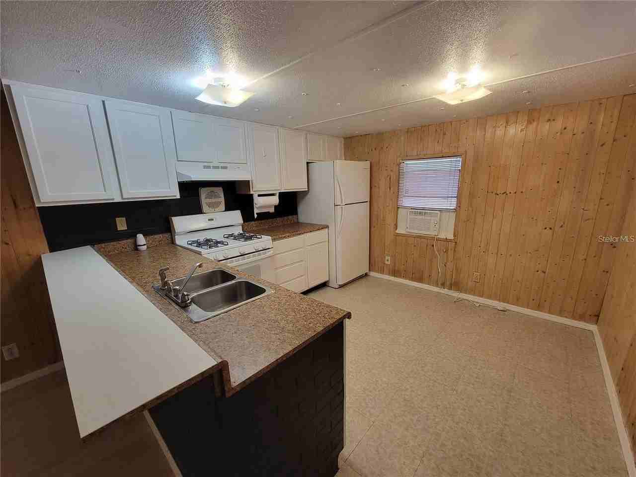 8957 Se 144th St - Photo 3 of 7