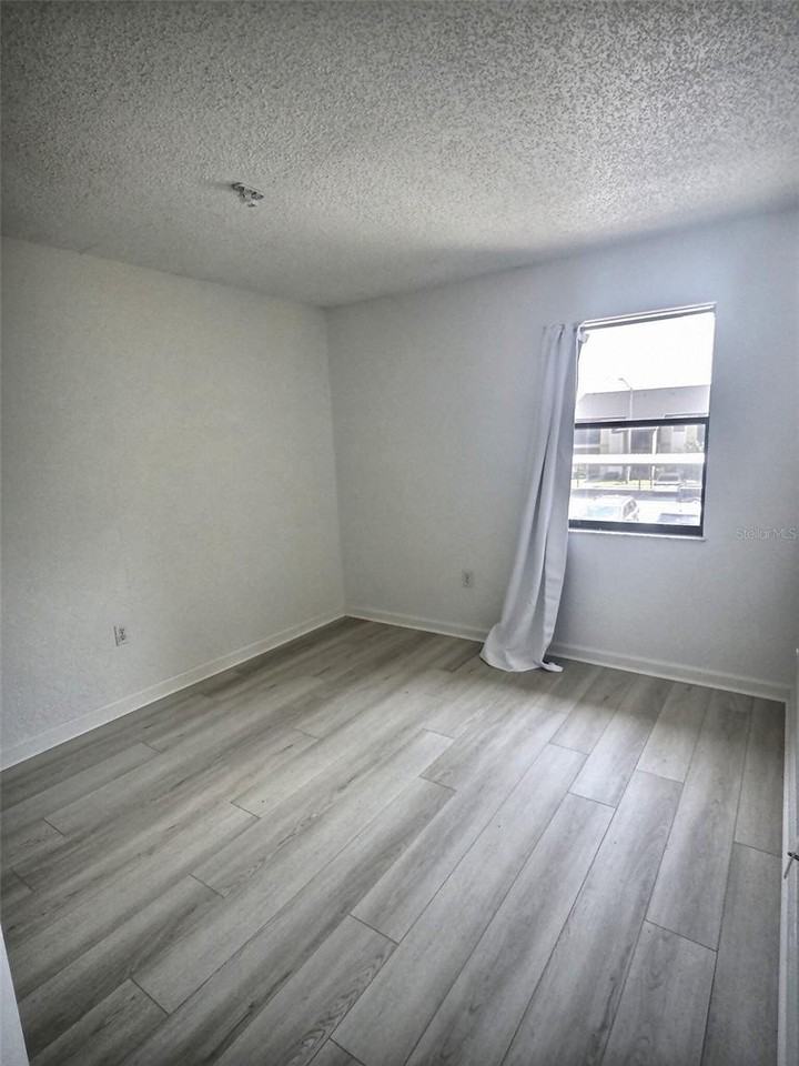 10100 Sailwinds Blvd N #202 - Photo 6 of 14