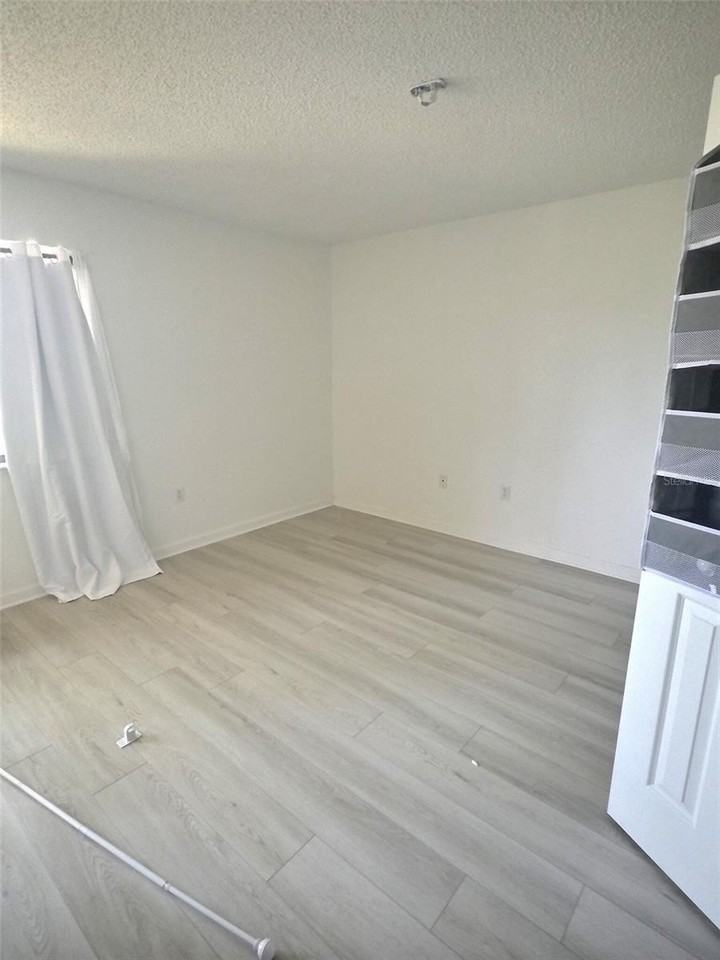 10100 Sailwinds Blvd N #202 - Photo 7 of 14