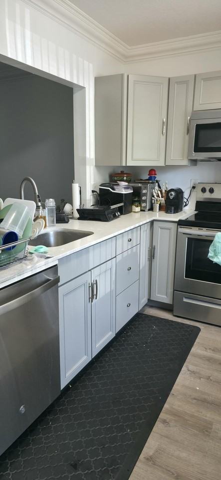 6091 Nw 61st Ave Apt 105 - Photo 2 of 22