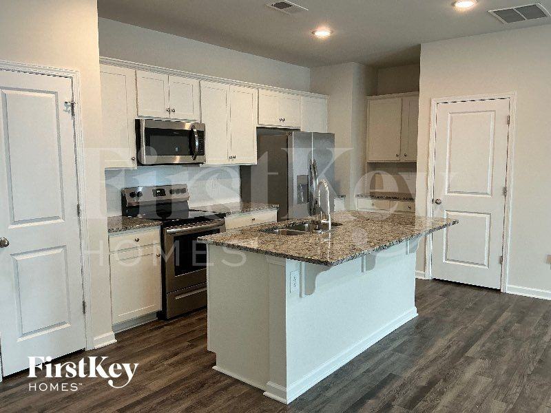 10743 Rivergate Dr Nw - Photo 3 of 10