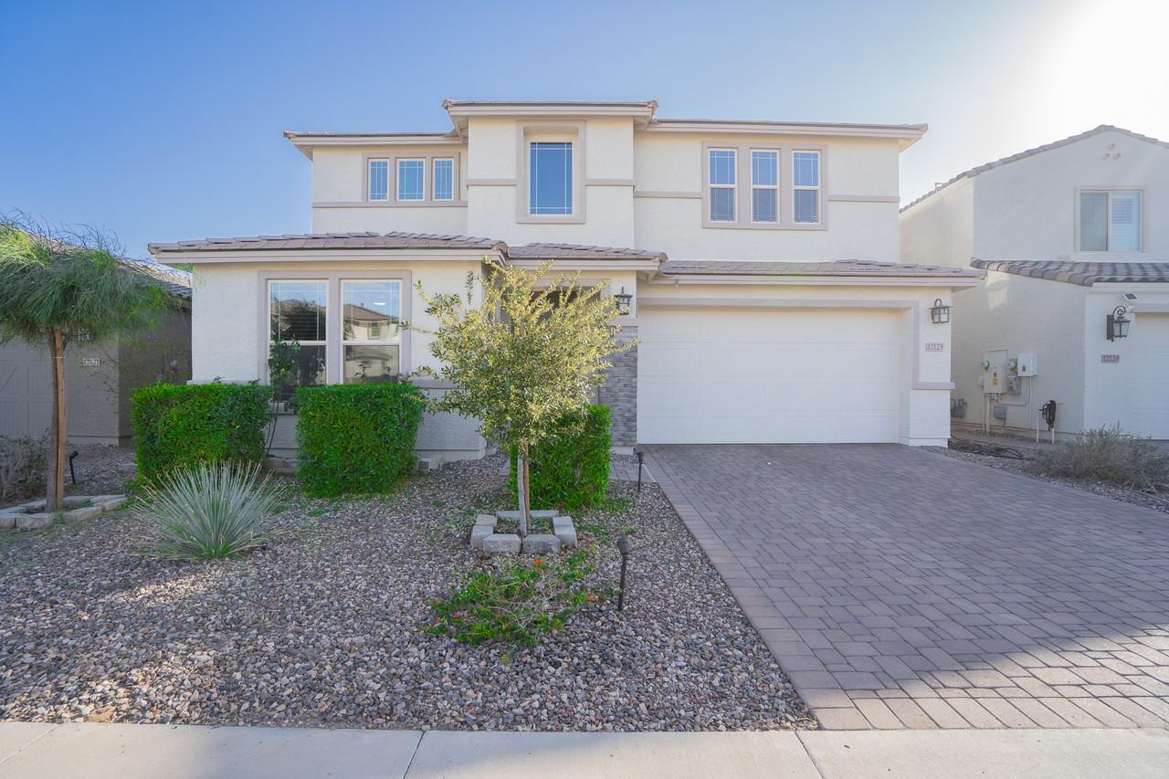 12125 W Luxton Ln - Photo 3 of 50