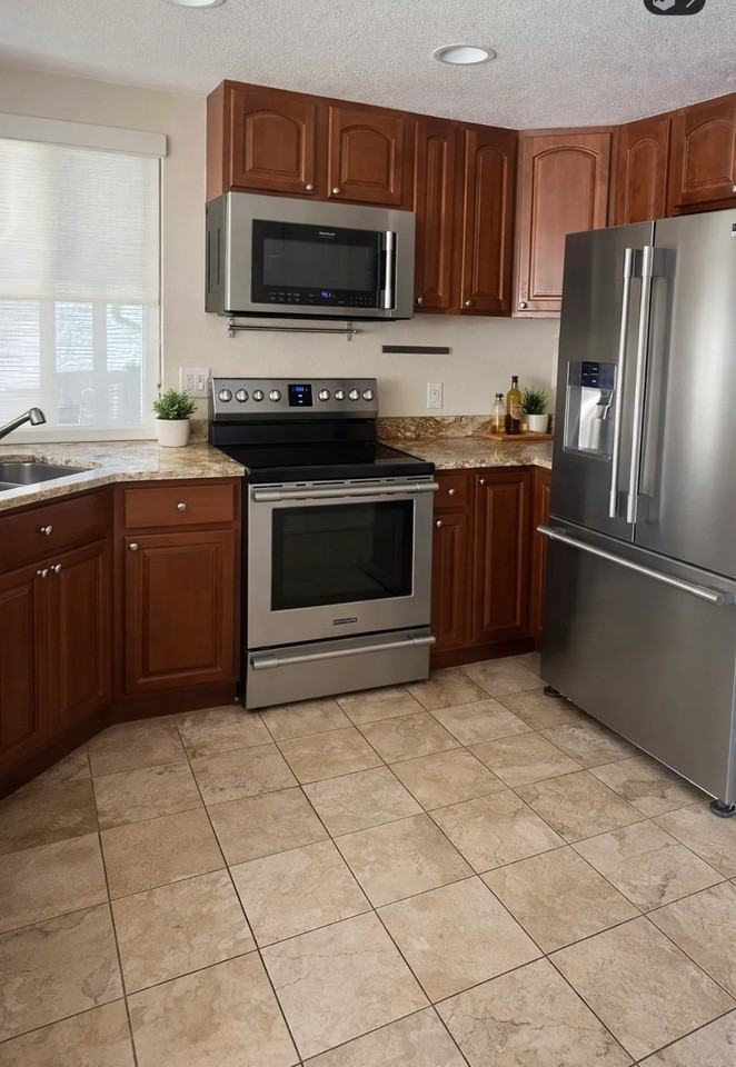 17336 E Kenyon Dr - Photo 3 of 13