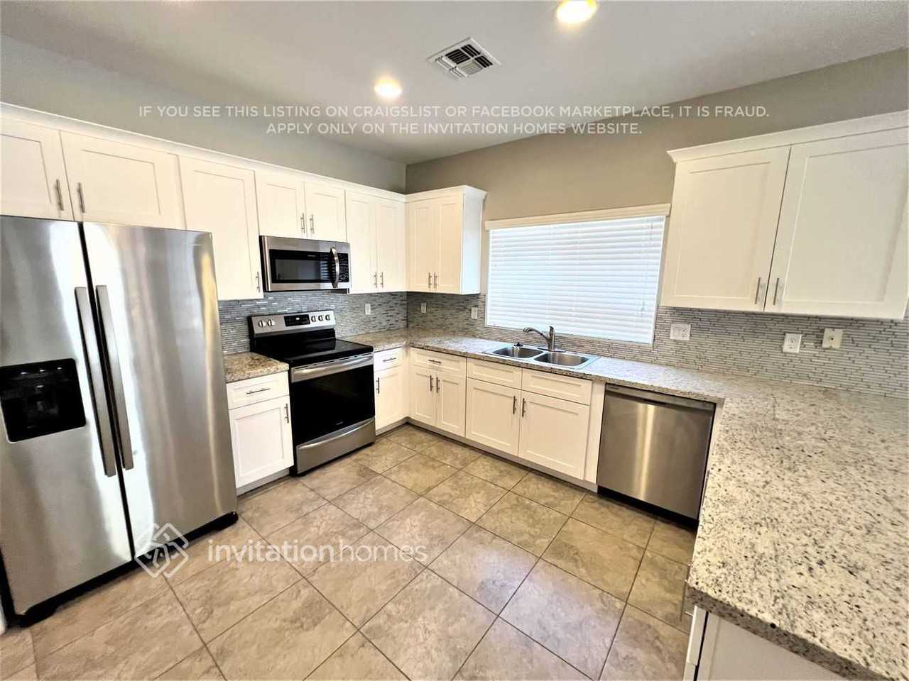 15147 N 137th Ln - Photo 3 of 13