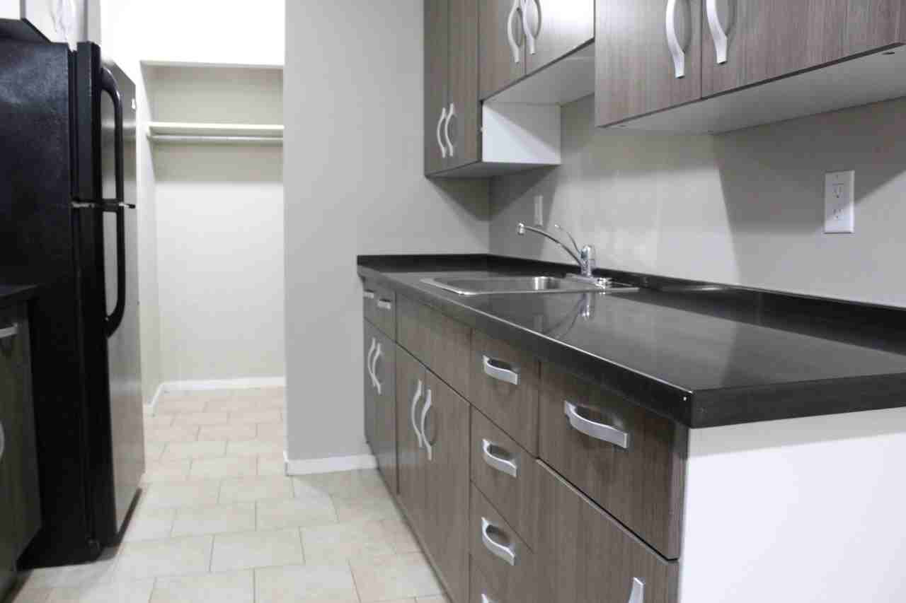 Leo Manor Apartments - Photo 7 of 13