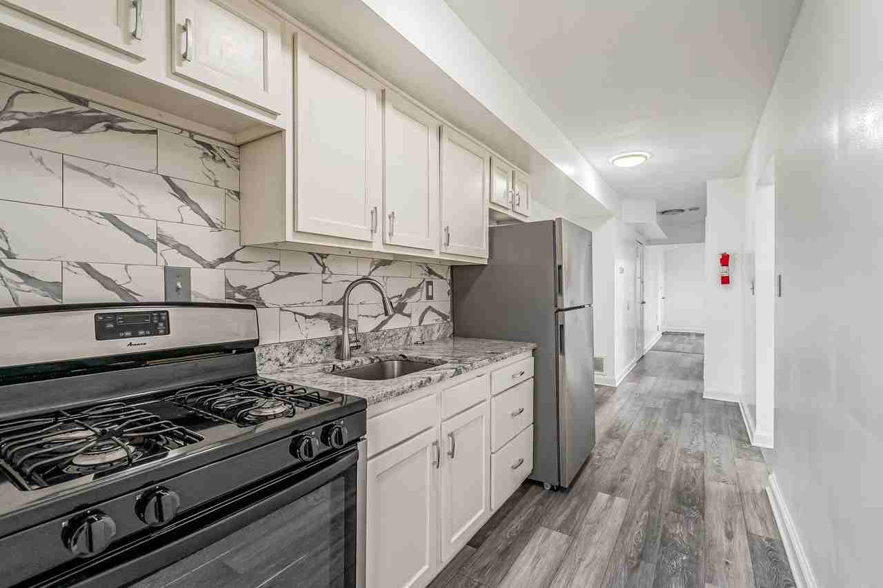 Astor Place Residences - Photo 6 of 15