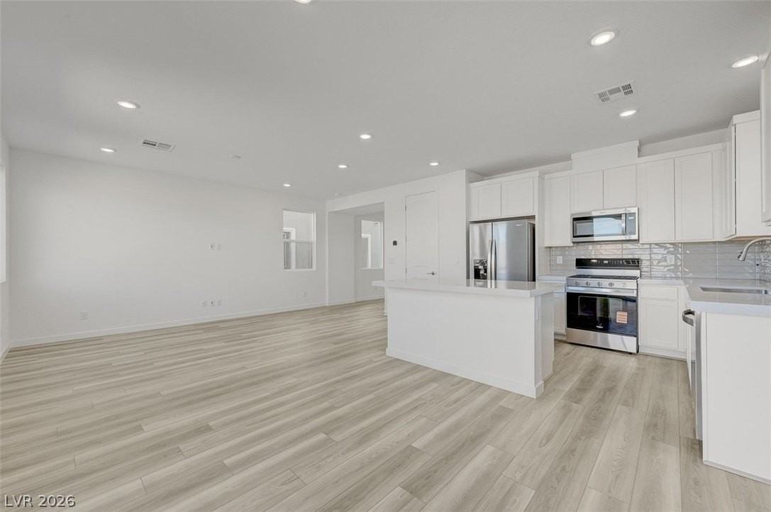 8484 W Agate Ave - Photo 6 of 49