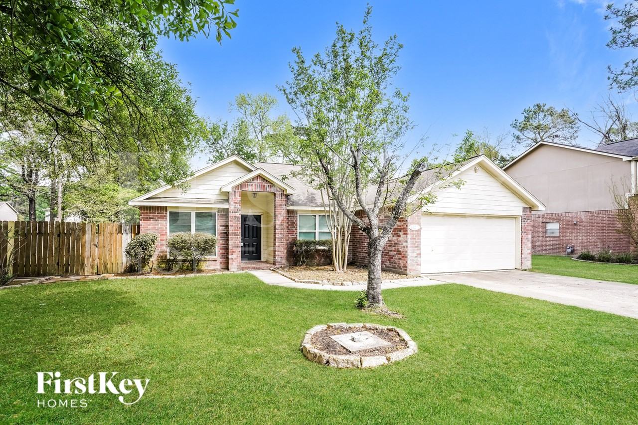 6722 Woodland Oaks - Photo 2 of 19