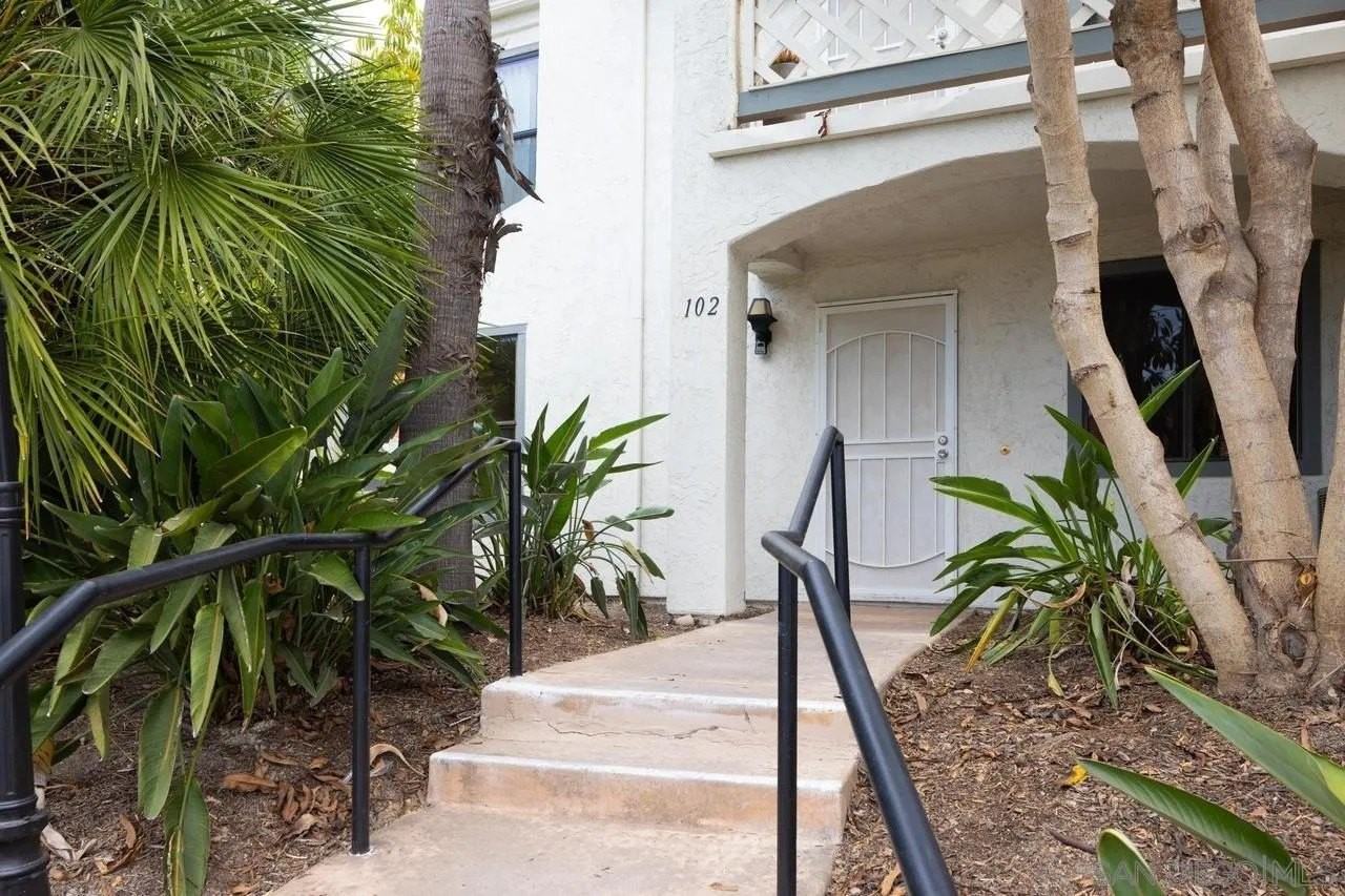 9449 Fairgrove Ln Unit 102 - Photo 2 of 21