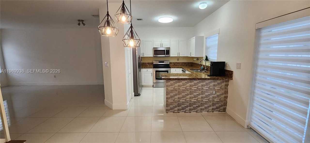 8909 Sw 225th Ter - Photo 4 of 26