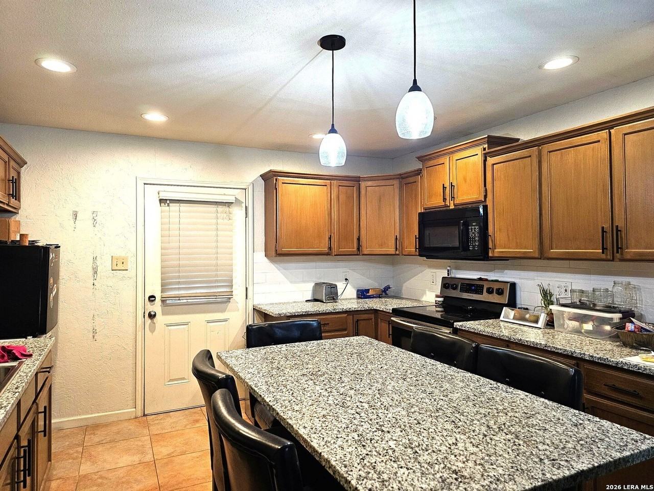 9406 Sugarloaf Dr - Photo 3 of 19