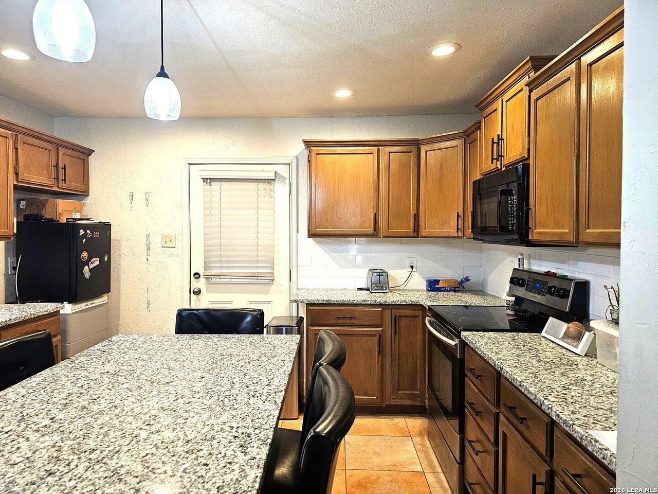 9406 Sugarloaf Dr - Photo 5 of 19