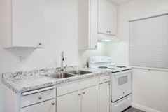 Winter Gardens | 1 & 2 Bedroom Apartments with Parking and Sparkling Pool! - Photo 1 of 1