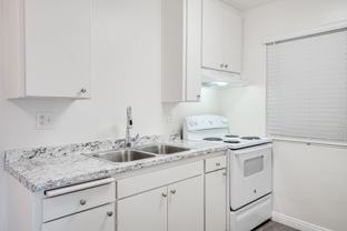 Winter Gardens | 1 & 2 Bedroom Apartments with Parking and Sparkling Pool! - Photo 1 of 1