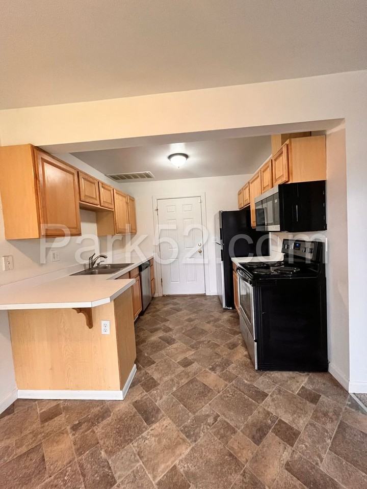 112 126th St E - Photo 2 of 19