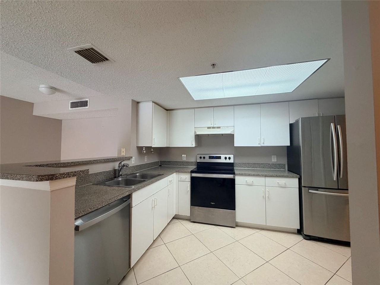 5025 Wiles Rd - Photo 2 of 16