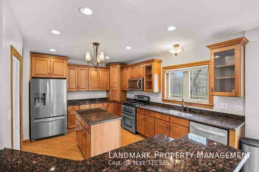 12313 S 71st Ct - Photo 3 of 39