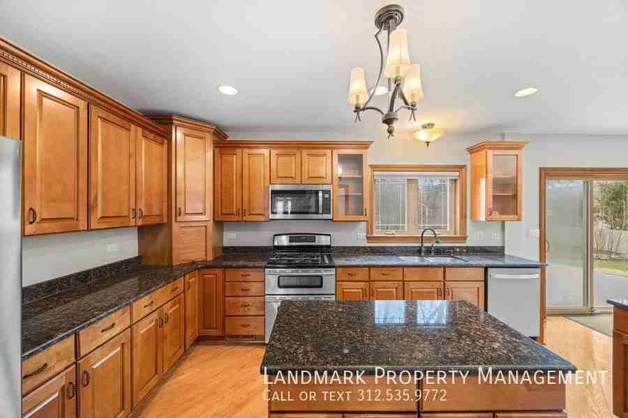 12313 S 71st Ct - Photo 4 of 39