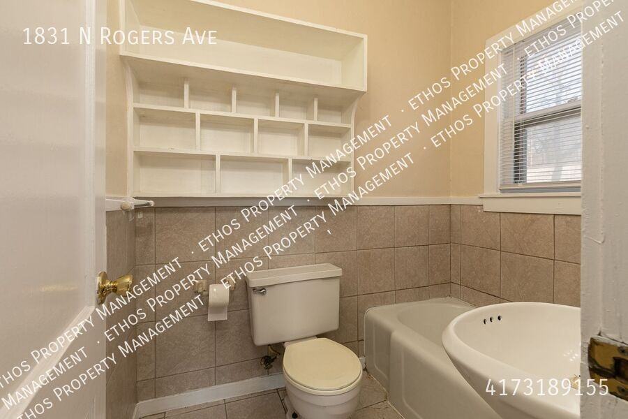 1831 N Rogers Ave - Photo 3 of 12