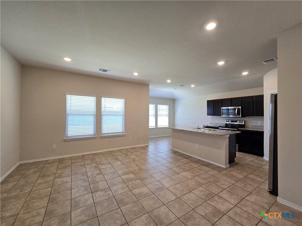 6114 Sally Ride Ln - Photo 3 of 23